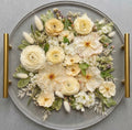 Overhead view of a custom handmade floral preservation keepsake tray by Said & Sealed Calgary, featuring professionally dried bridal blooms.
