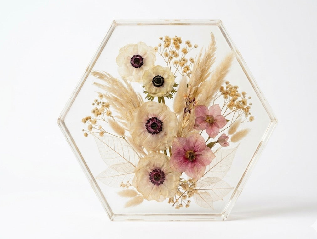 Real wedding flowers professionally dried in silica gel and cast in epoxy resin.
